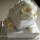 3 tier square wedding cake decorated with Lisianthus and Frangapanni decorations