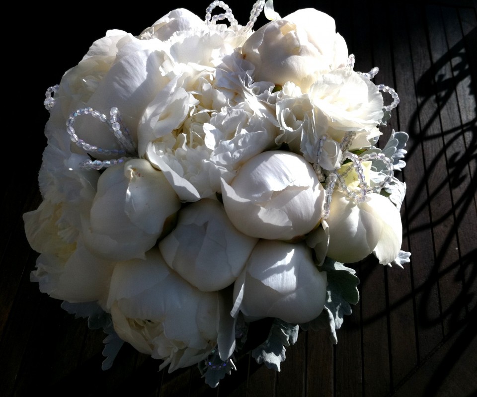 White closed peonies and crystal bouquet