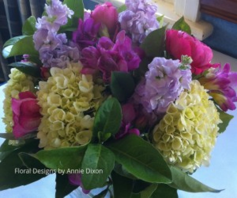 Bedside table arrangement of perfumed Spring flowers