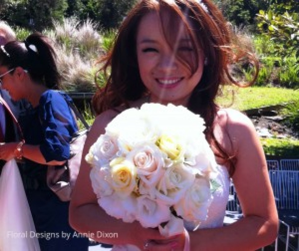 Bride and her pastal rose bouquet
