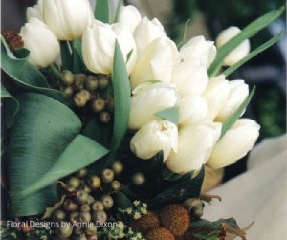 Autumnal bridal bouquet of white tulips