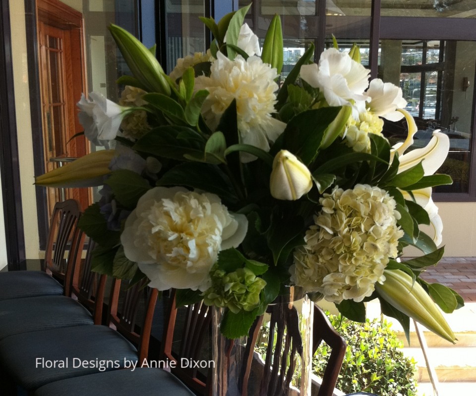 Cylinder arrangement of peonies, hydrangea, lilies and lissianthas