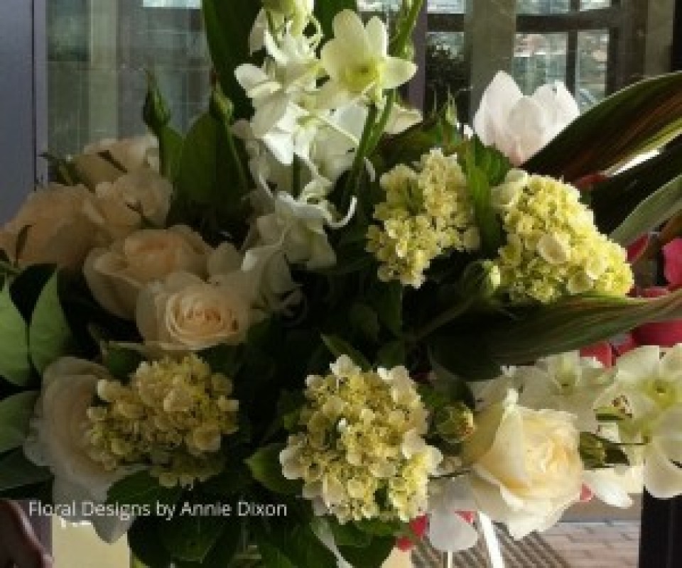 Ivory and cream display of Hydrangea, Orchids and Roses