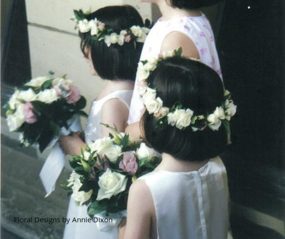 Flowergirls adorned with hair galands and matching posies