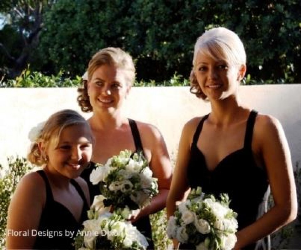 3 bridesmaids with posies of green hydrangea and white lisianthus